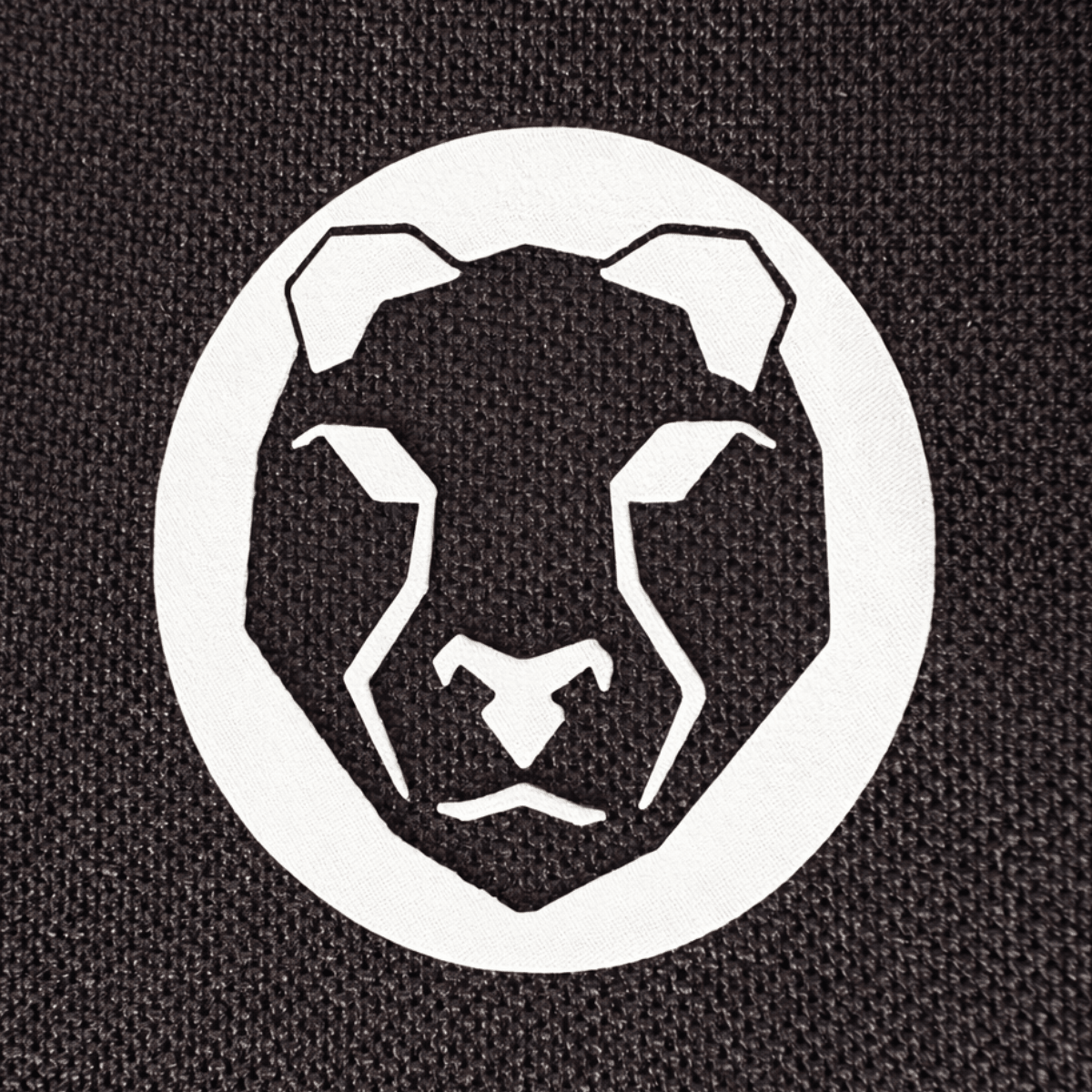 Close-up logo detail on Mammal V3 5mm elbow sleeves
