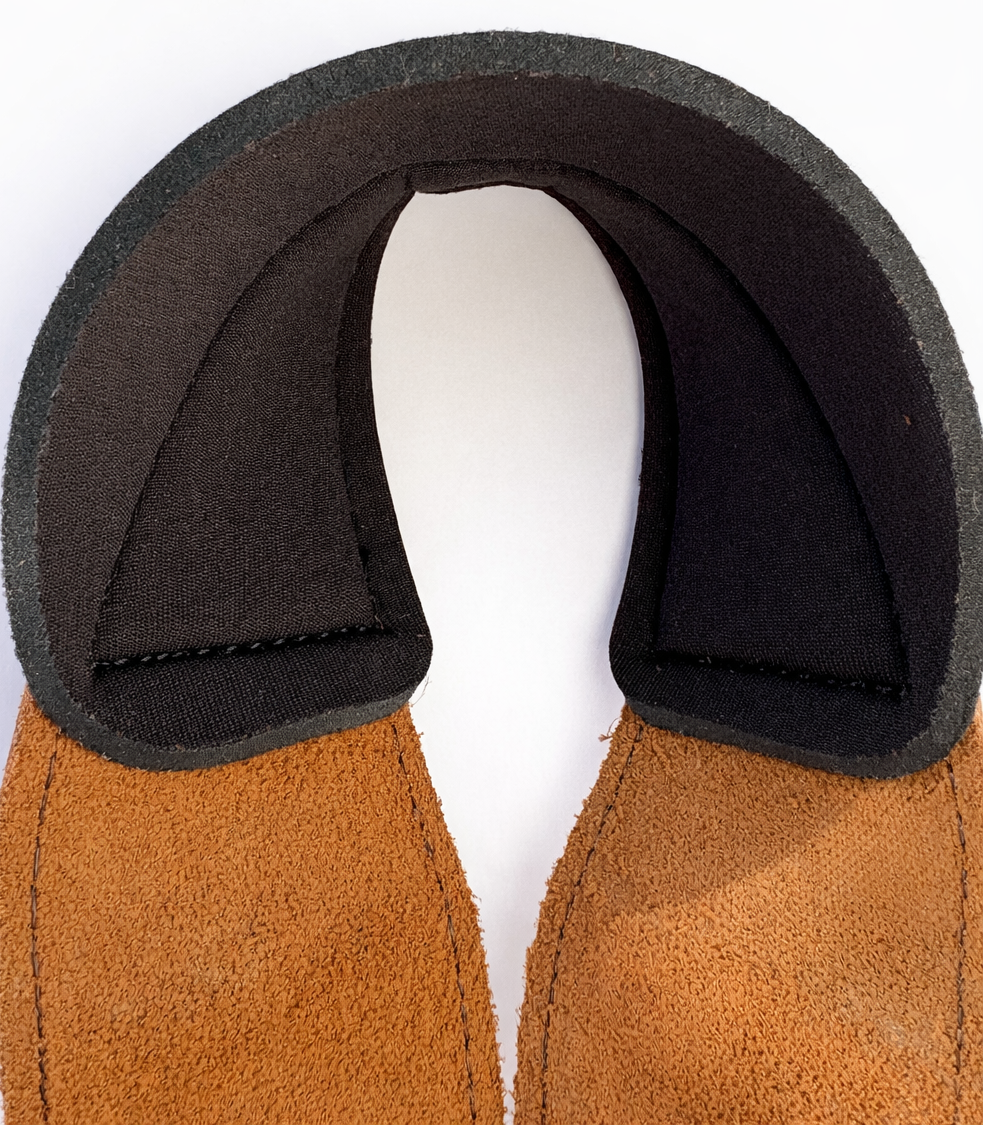 Close-up of a brown leather wrist support for weightlifting straps on a white background