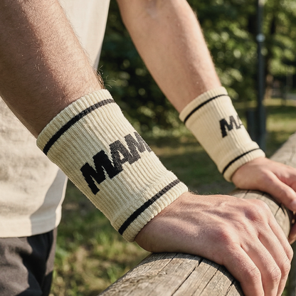 Person wearing long wristbands sweatbands 15cm cream colour during functional fitness training