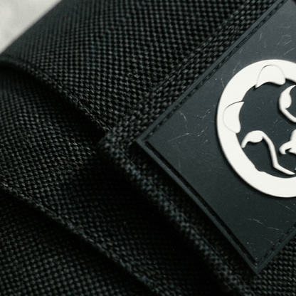 Mammal Strength knee wraps black fabric texture with logo patch detail